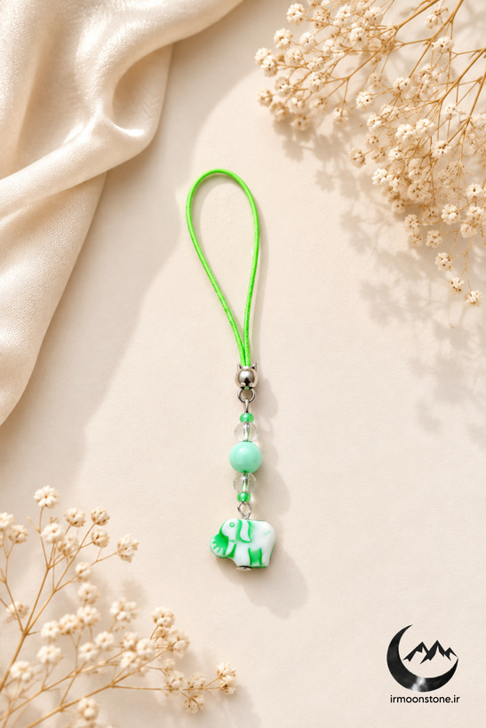 آویز گوشی فیل سبز با مهرههای رنگی و طراحی فانتزی